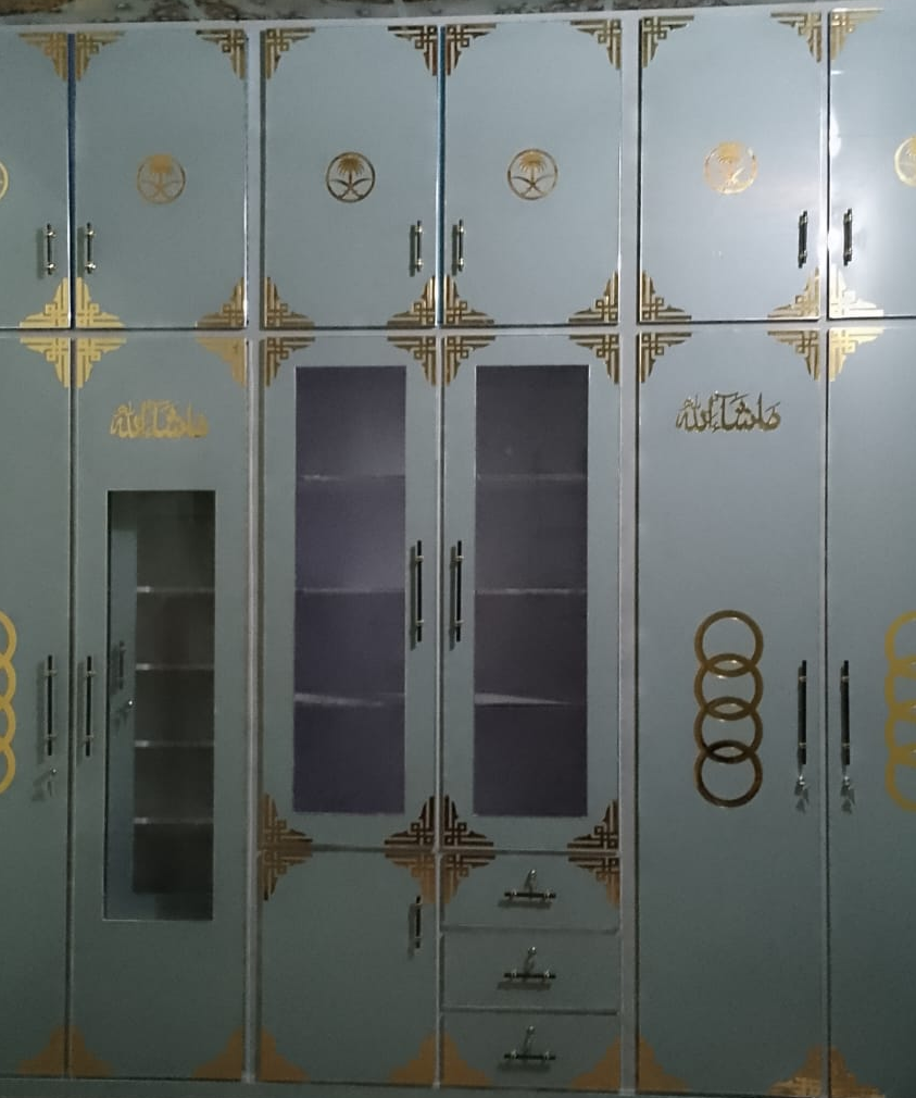 Large wardrobe with triangle shape acrylic T-1 design in a room setting